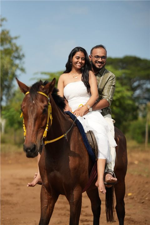 Akshay and Hansa sharing a joyful horseback moment